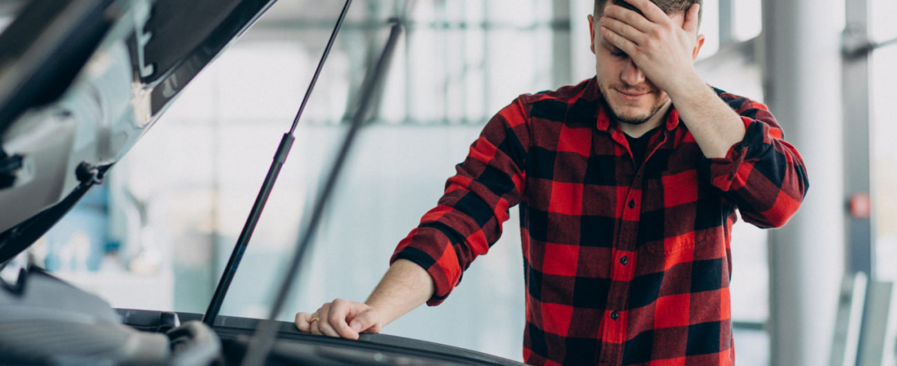 young-man-making-diagnostics-vehicle