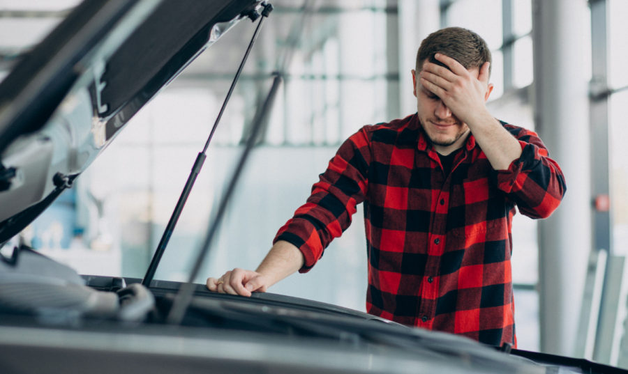 young-man-making-diagnostics-vehicle